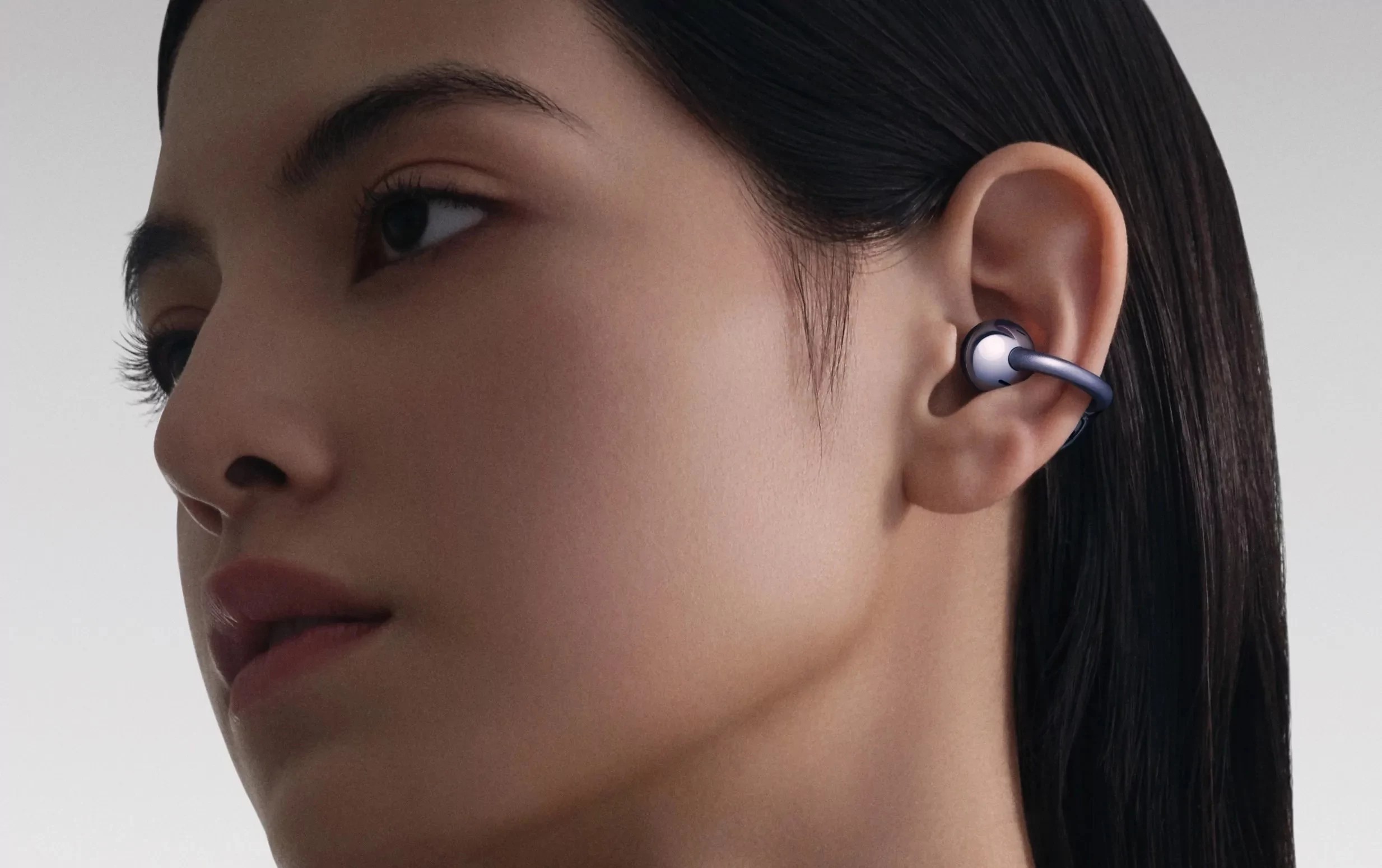 The headphones do not fit into the ear canal or even press against it. Fits behind the ear and does not put pressure during prolonged use.