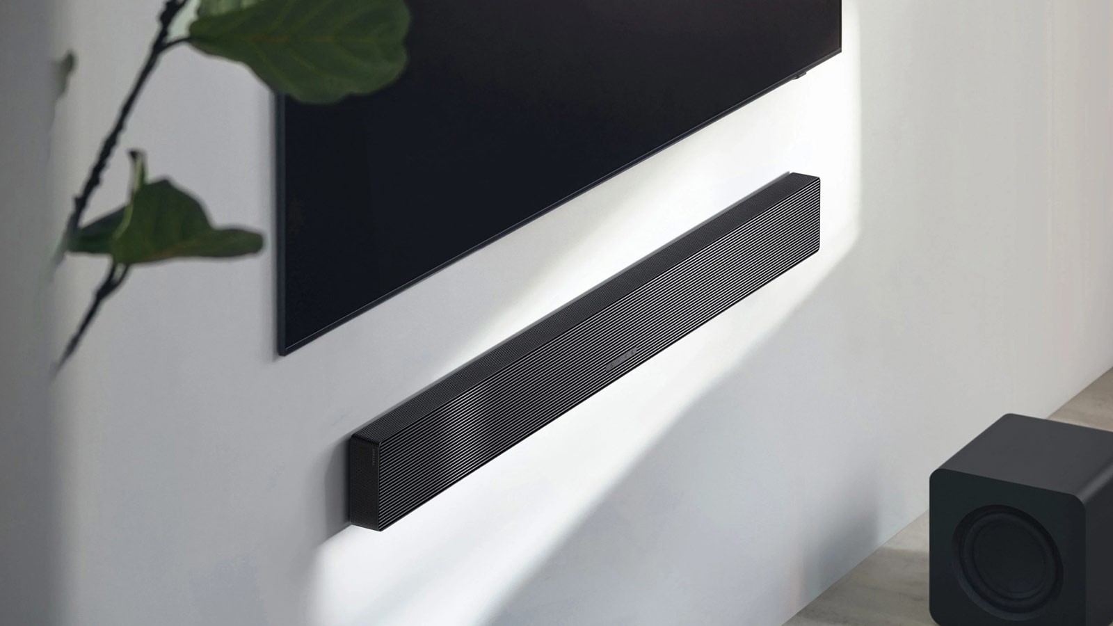 The soundbar itself consists of a central speaker, two full-range drivers, and two upward-firing speakers.