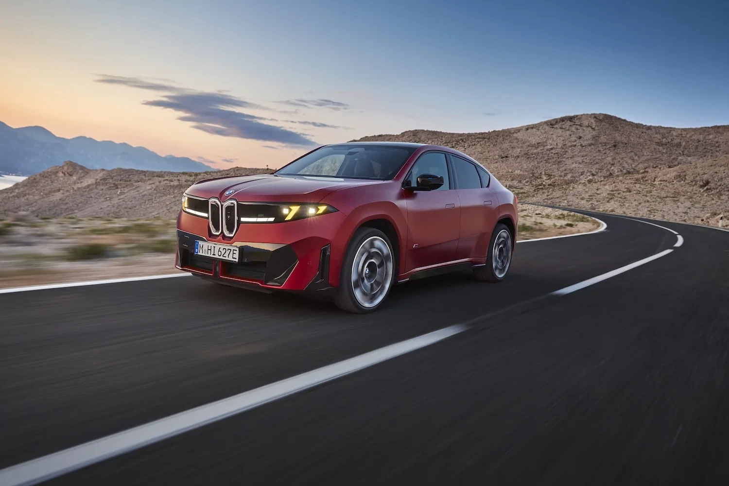 The BMW iX4 will launch in two all-wheel-drive configurations, led by a 469-horsepower model with a stated range of 828 kilometers.