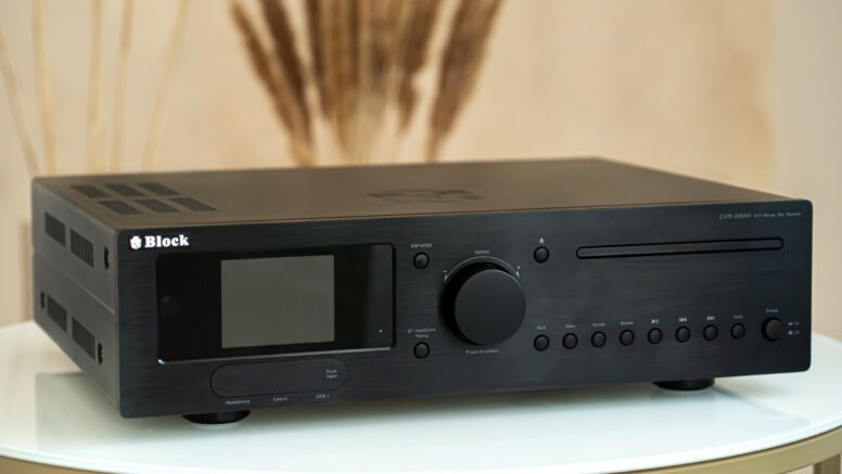 AV receiver connected to a TV, speakers, subwoofer, and HDMI home cinema sources