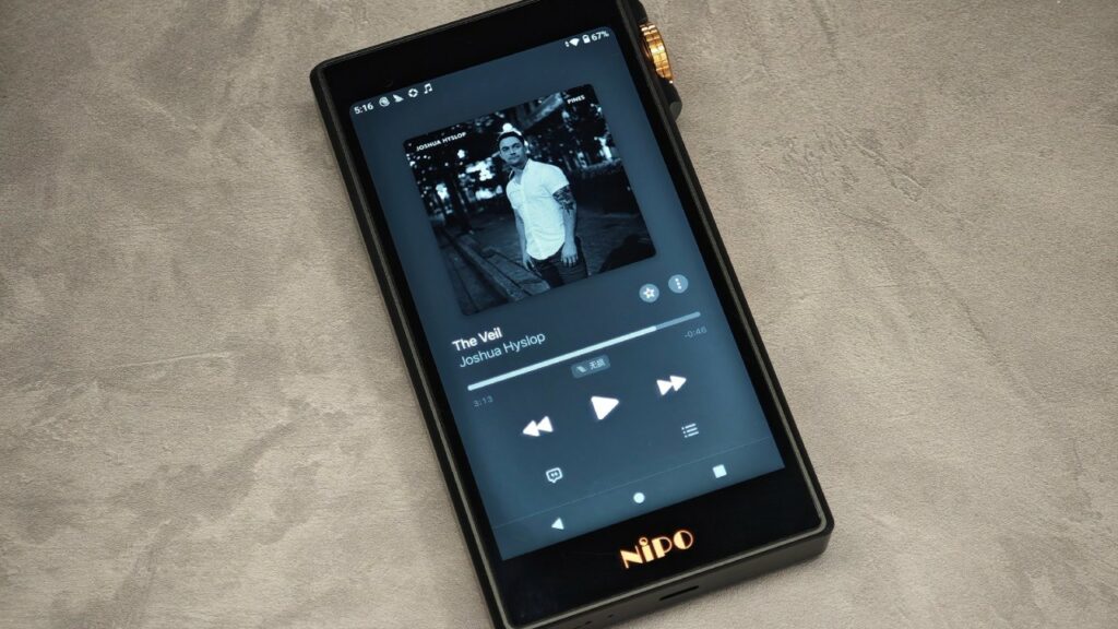 Portable digital audio player connected to wired headphones, an amplifier and active speakers