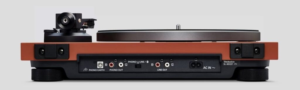 Strobe disc on a turntable platter being checked with a strobe light for speed accuracy