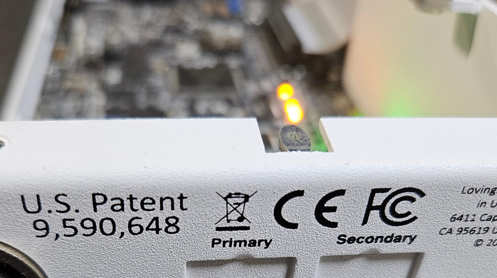 Rear panel of a DAC showing USB, coaxial, optical, AES/EBU, XLR and RCA connections