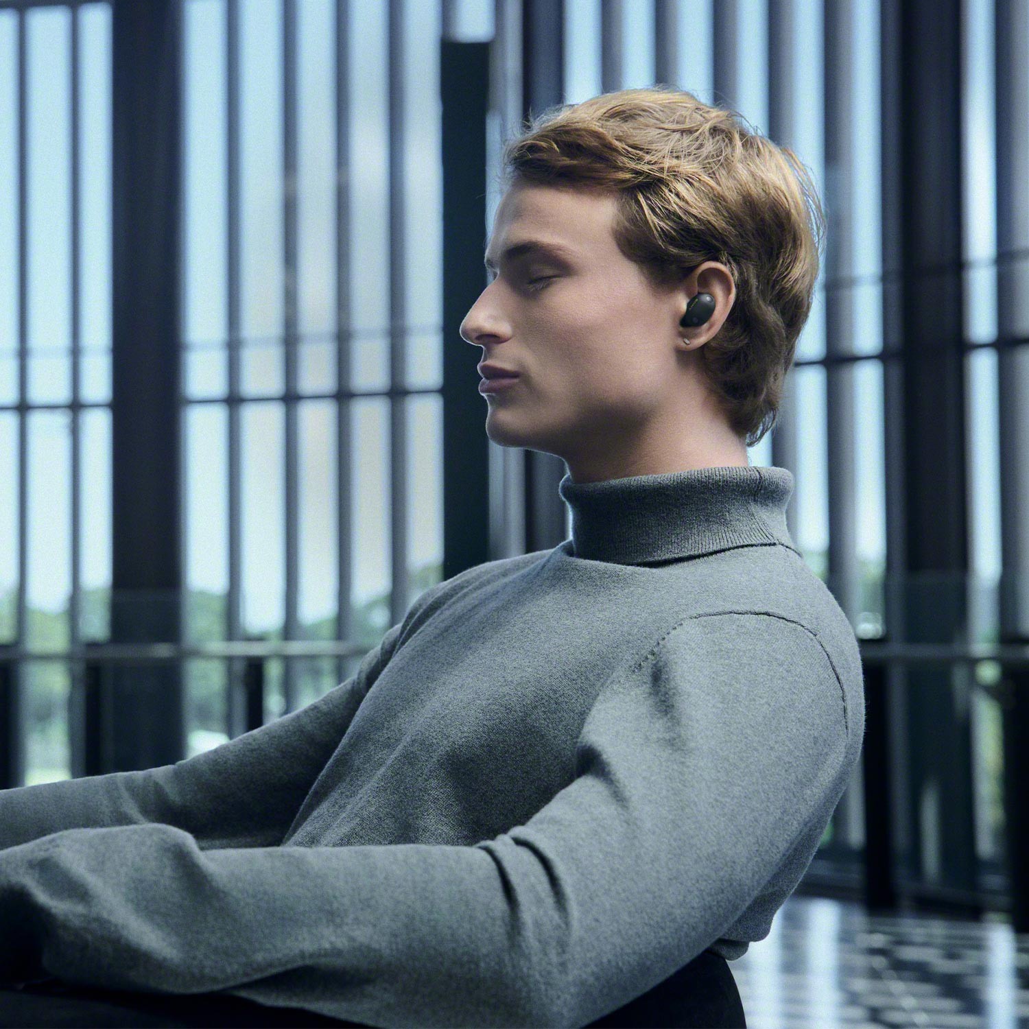 The rounded housing sits flush in the ear, offering both comfort and improved passive noise isolation.