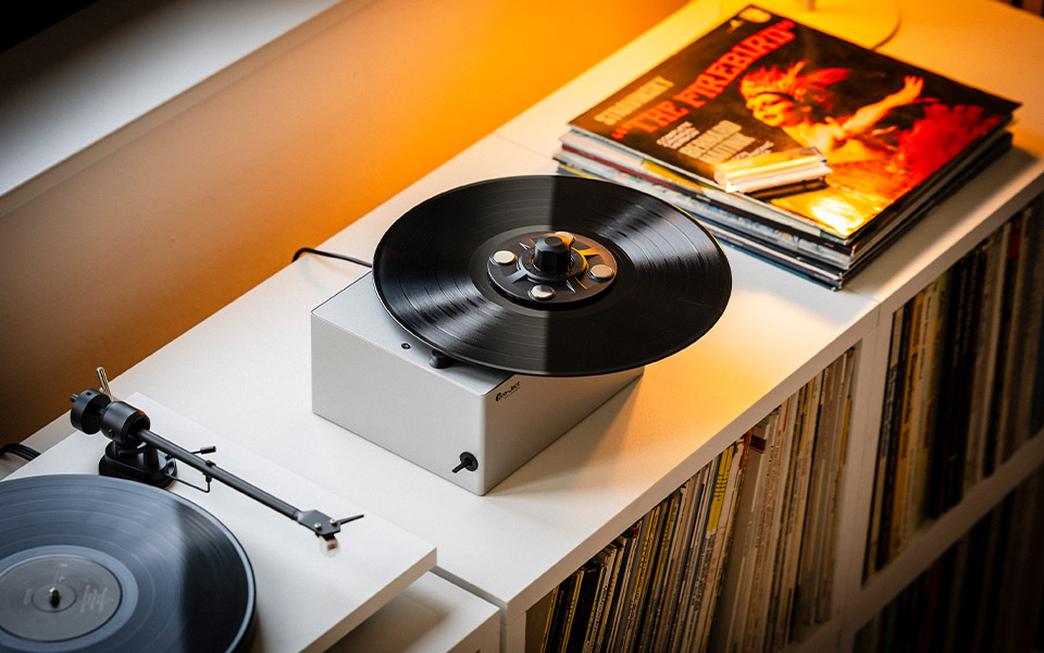 Strobe disc on a turntable platter being checked with a strobe light for speed accuracy