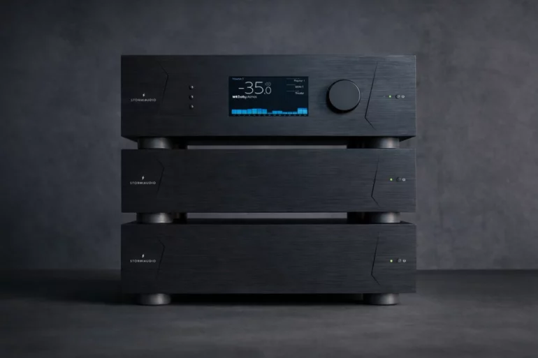 Phono preamplifier connected between a turntable and integrated amplifier with gain, loading, capacitance and ground settings