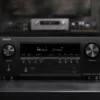 Dolby Atmos home cinema speaker layout connected to an AV receiver with TV and subwoofer