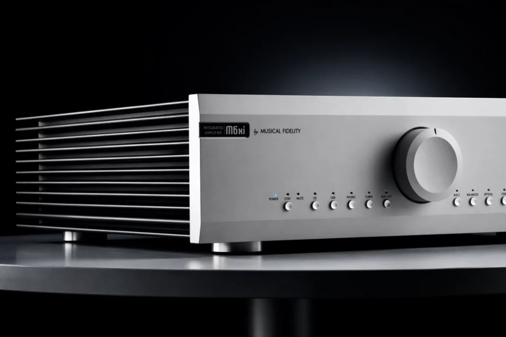 Stereo integrated amplifier connected to a television with an HDMI ARC cable and passive speakers