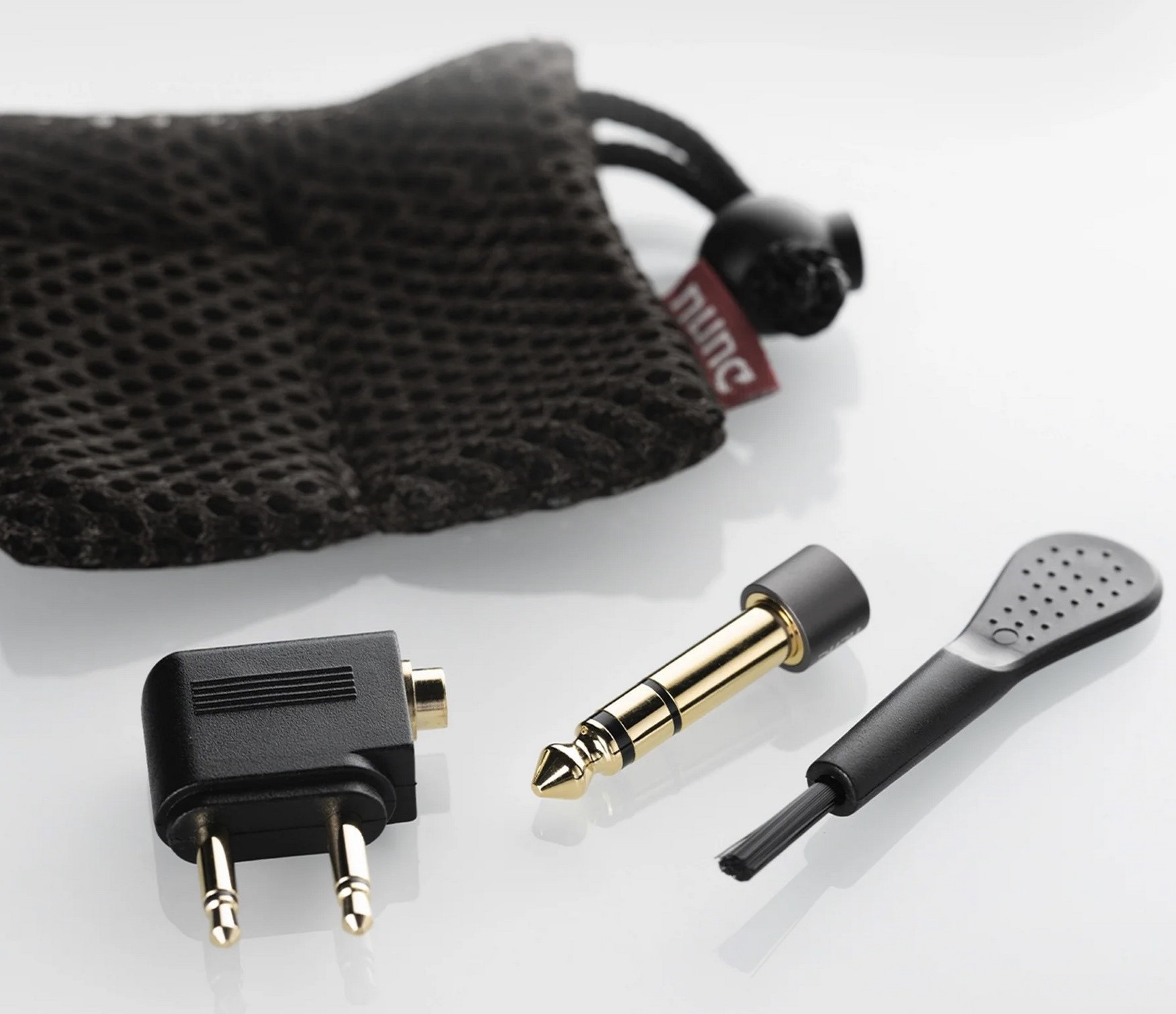 DUNU Kaoru: A High-End IEM Built Around Vocal Focus and FitEar Engineering 10 The package includes a FitEar 013 cable with a proprietary FitEar two-prong connector and an Oyaide 3.5mm plug. A set of ear tips, a protective Pelican 1010 case, and additional accessories for storage and maintenance are also included.