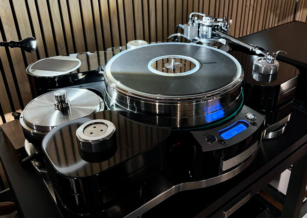 How to Set Up a Turntable for Better Sound: Tracking Force, Anti-Skate, VTA, Placement, and Phono Connections 9 Turntable tonearm and cartridge being adjusted for tracking force, anti-skate, VTA, placement, and phono connection setup