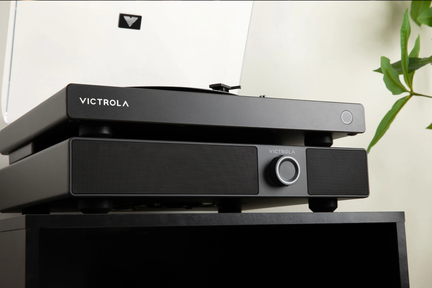 The Victrola Soundstage combines an active speaker system with a low-profile, vibration-conscious design intended for placement beneath a turntable.