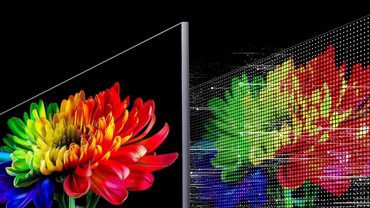 Large-screen LCD televisions displayed in a retail showroom ahead of holiday promotions