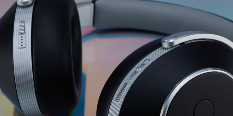 T+A Solitaire T Pro Is Built for More Than Bluetooth 22 Black over-ear headphones showing metallic yokes and controls along the earcup edges