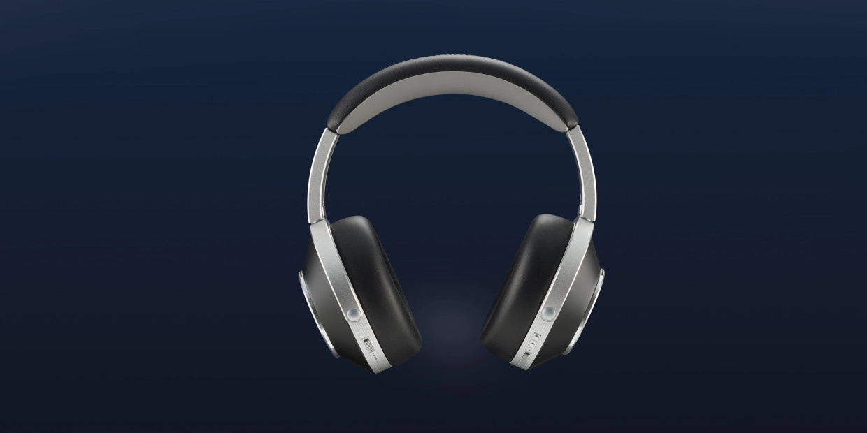 T+A Solitaire T Pro Is Built for More Than Bluetooth 25 Full front view of black and silver over-ear headphones on dark blue
