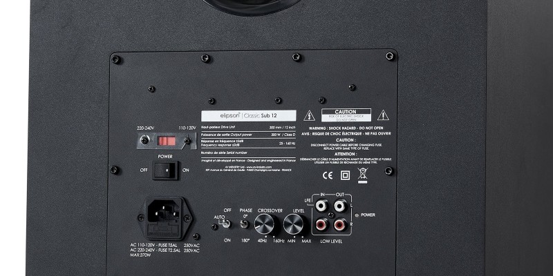 Close view of Classic Sub 12 amplifier plate with power inlet, switches, dials and sockets