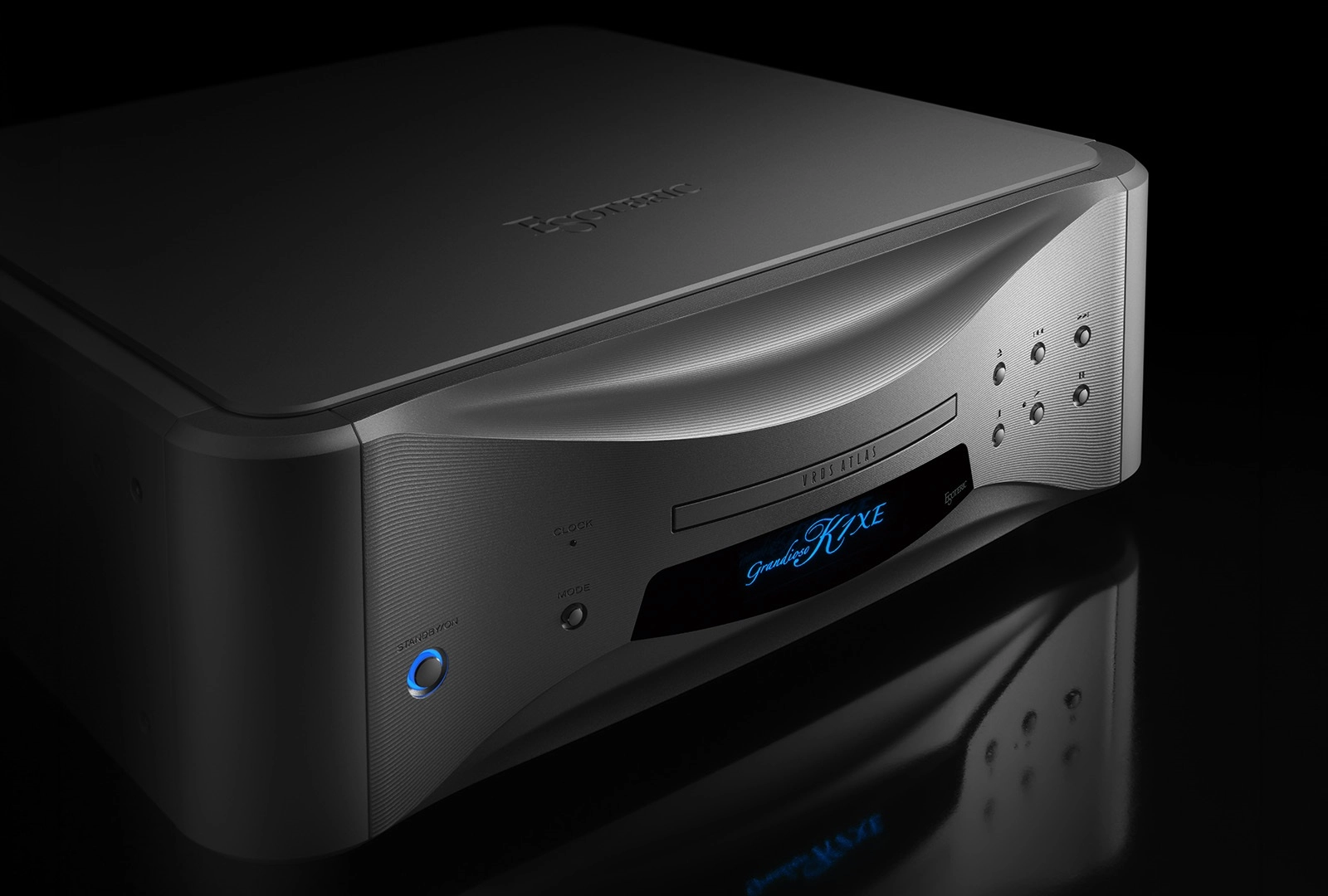 Inside the Grandioso K1XE: Esoteric Builds Its Flagship Around Disc Control, a Discrete DAC and Modular Power 23 Three-quarter view of the silver Grandioso K1XE with blue display and sculpted front panel
