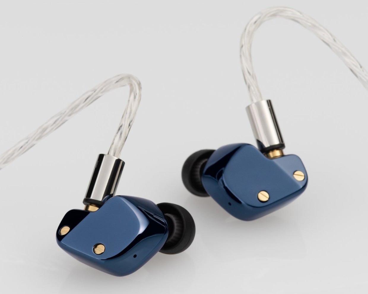 Final Reworks Its Flagship-Style A8000 DC Around Magnesium 23 Rear view of blue earphones with gold fasteners, black tips and looping cables
