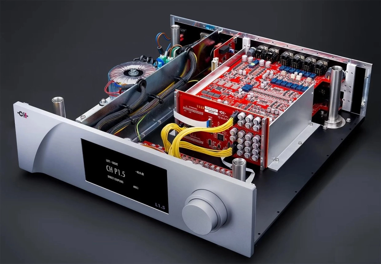 Inside CH Precision’s P1.5 and L1.5 Preamp Redesigns 24 Open CH preamplifier viewed from front with red electronics, transformer, display and large rotary controller