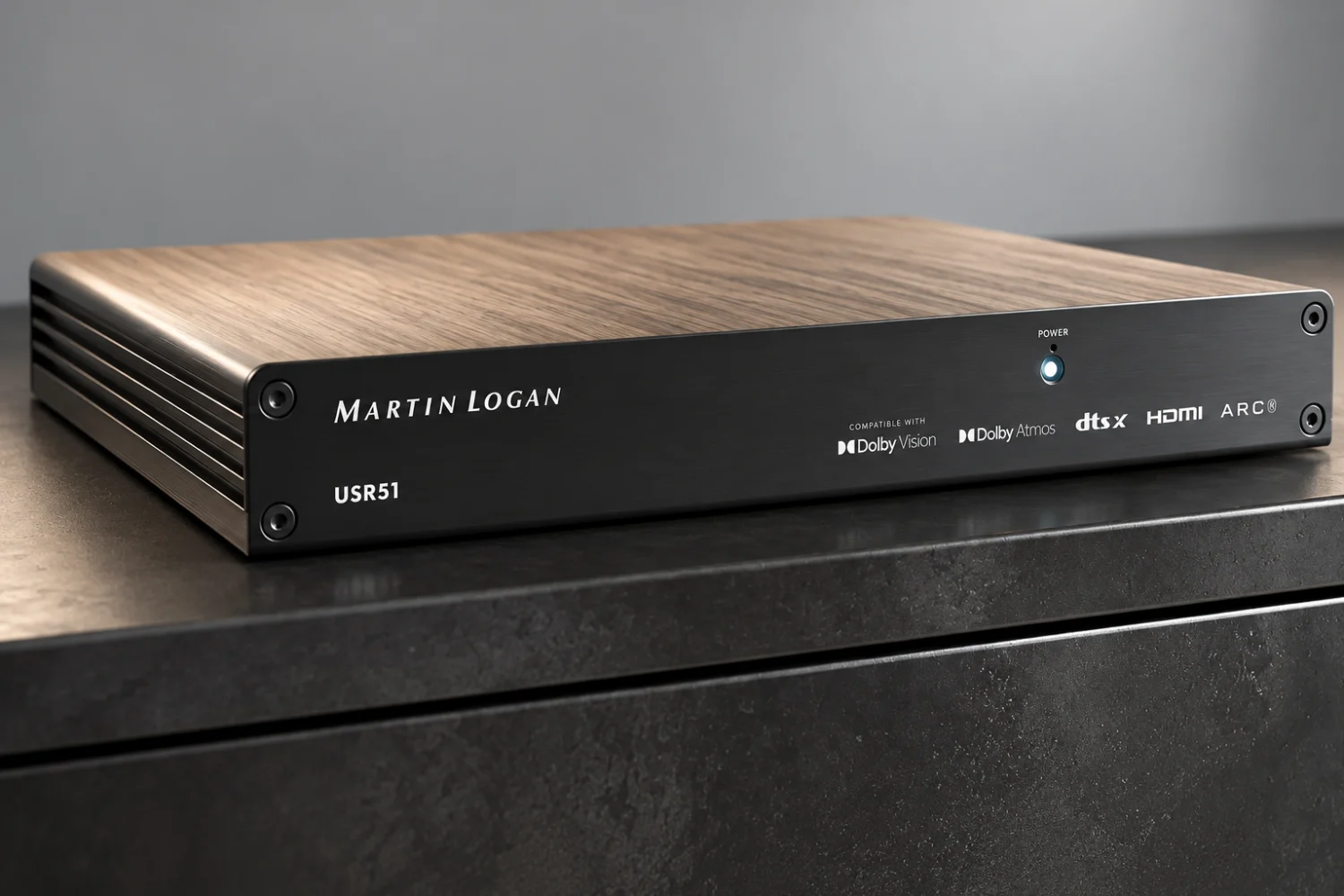 The MartinLogan USR51 packages a five-channel AV receiver into a chassis intended for hidden installation behind a television, in a wall recess or inside shallow furniture.